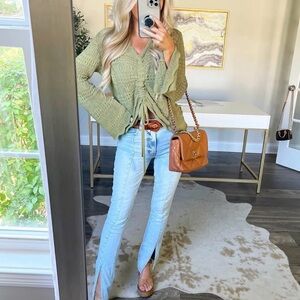 Green Knit Sweater with Light Blue Jeans